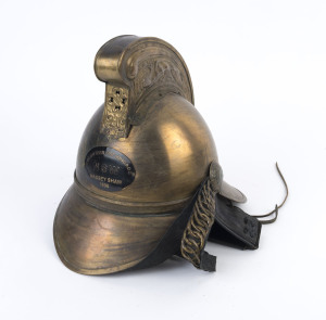 FIRE BRIGADE HELMET: reproduction of a brass 'Massey Shaw' NSW Volunteer Fire Brigade Helmet, height 30cm, c.1970s.