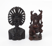 Asian carved statues of a Laughing Buddha and a Female Deity, both in dark wood, taller 23cm. (2) 