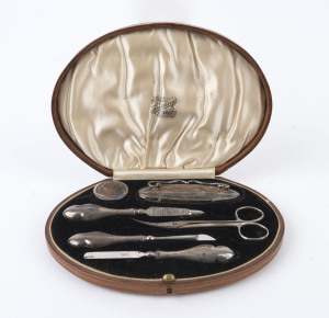 Sterling silver six-piece manicure set, stamped 'G&CLd', hallmarked Birmingham 1919, Dunklings (Melbourne) presentation case, 20cm wide.