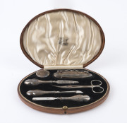Sterling silver six-piece manicure set, stamped 'G&CLd', hallmarked Birmingham 1919, Dunklings (Melbourne) presentation case, 20cm wide.