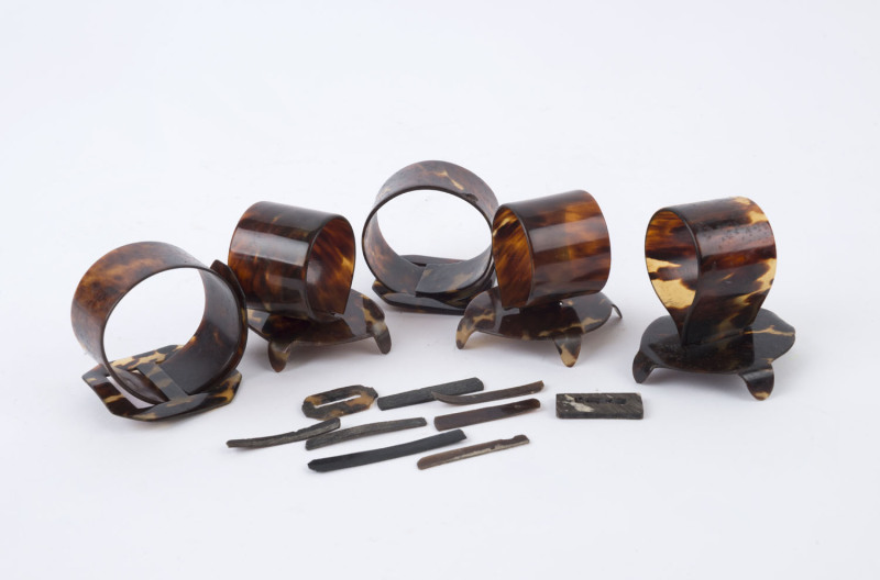 NAPKIN RINGS: Five tortoiseshell napkin rings, late 19th century.