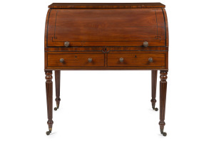 An English Regency mahogany cylinder top desk with ebony Greek key inlay, circa 1825, 108cm high, 101cm wide, 67cm deep