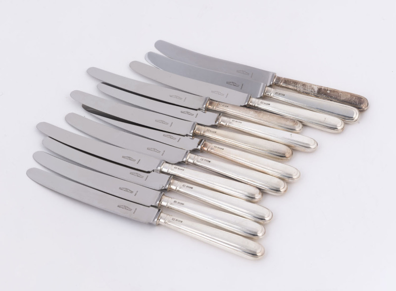 A set of twelve silver handled dinner knives by Cooper Brothers & Sons Ltd, 1975, 