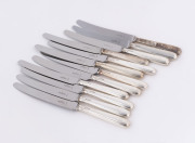 A set of twelve silver handled dinner knives by Cooper Brothers & Sons Ltd, 1975,&nbsp;