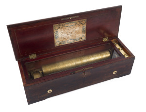 A 19th century Swiss music box made by L.F. Geneve, playing 8 aires with ratchet lever wind. Lever operation for start, stop, change and repeat aire. Original aire sheet to the inside lid, the pin cylinder movement housed in a rosewood veneered case with 