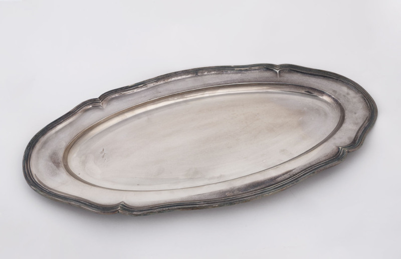 A sterling silver oval tray, circa 1965. Engraved underneath "Associated National Insurance company Ltd., Sydney, October 18th, 1965.", 55cm wide, 29cm deep, 1085 grams.