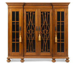 An antique French walnut bookcase, 19th century, 140cm high, 150cm wide, 40cm deep