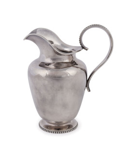 A Dutch silver cream jug, c.1870, 1st grade fine silver, by A. Bonebakker & Zoon, Amsterdam; with assay mark of H.W. Van Riel, Amsterdam, Height: 12.5cm, weight: 240gms. As a purveyor to the royal family, Bonebakker forged swords for the Princes of Orang