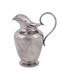 A Dutch silver cream jug, c.1870, 1st grade fine silver, by A. Bonebakker & Zoon, Amsterdam; with assay mark of H.W. Van Riel, Amsterdam, Height: 12.5cm, weight: 240gms. As a purveyor to the royal family, Bonebakker forged swords for the Princes of Orange, designed crockery sets for the Court and, in 1840, made the crown for King William II, which is still being used during coronation ceremonies to this day.
