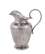 A Dutch silver cream jug, c.1870, 1st grade fine silver, by A. Bonebakker & Zoon, Amsterdam; with assay mark of H.W. Van Riel, Amsterdam, Height: 12.5cm, weight: 240gms. As a purveyor to the royal family, Bonebakker forged swords for the Princes of Orang