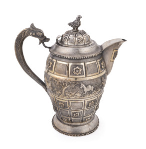 An antique Burmese silver teapot with rural scene frieze and remains of gilt finish, 19th/20th century, ​23cm high, 775 grams