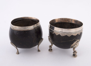 Two Georgian silver mounted coconut bowls with cabriole legs on pad feet, 18th/19th century, 10.5cm high