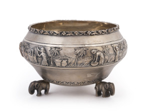 An antique Burmese silver bowl decorated with repoussé frieze and elephant feet, 19th/20th century, 8cm high, 13cm diameter, 255 grams