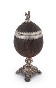 An antique Austro-Hungarian silver mounted coconut box with squirrel finial, 19th century, 24cm high