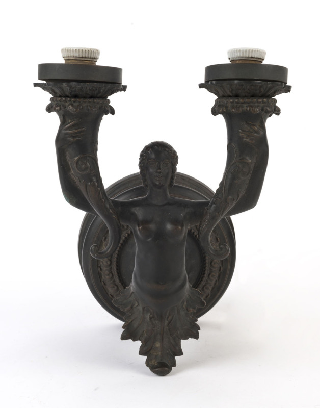 CLIVEDEN MANSION, MELBOURNE. An antique French caryatid two branch wall sconce from the famed East Melbourne Mansion, patinated bronze, 19th century, 39cm high