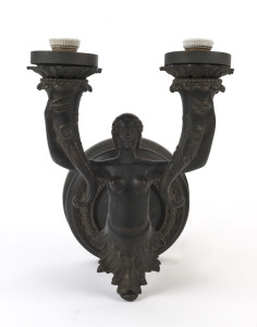 CLIVEDEN MANSION, MELBOURNE. An antique French caryatid two branch wall sconce from the famed East Melbourne Mansion, patinated bronze, 19th century, 39cm high
