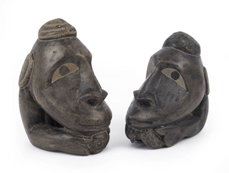 A pair of Nguzu Nguzu canoe prow ornaments, carved stone, Solomon Islands, 20th century, 13cm and 15cm high