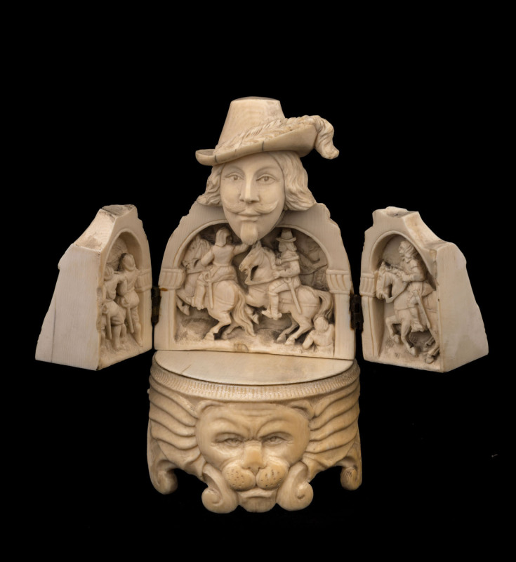 An antique dieppe French ivory figural triptych in the form a musketeer, 18th/19th century, 15cm high