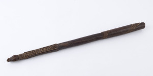 A tribal club with carved crocodile and snake decoration, early 20th century, 56.5cm long