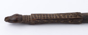 A tribal club with carved crocodile and snake decoration, early 20th century, 56.5cm long - 2