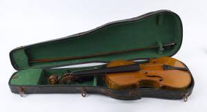 A German vintage violin in case with bow, early 20th century, bearing label "Copy Of ANTONIUS STRADIVARIUS", 60cm long