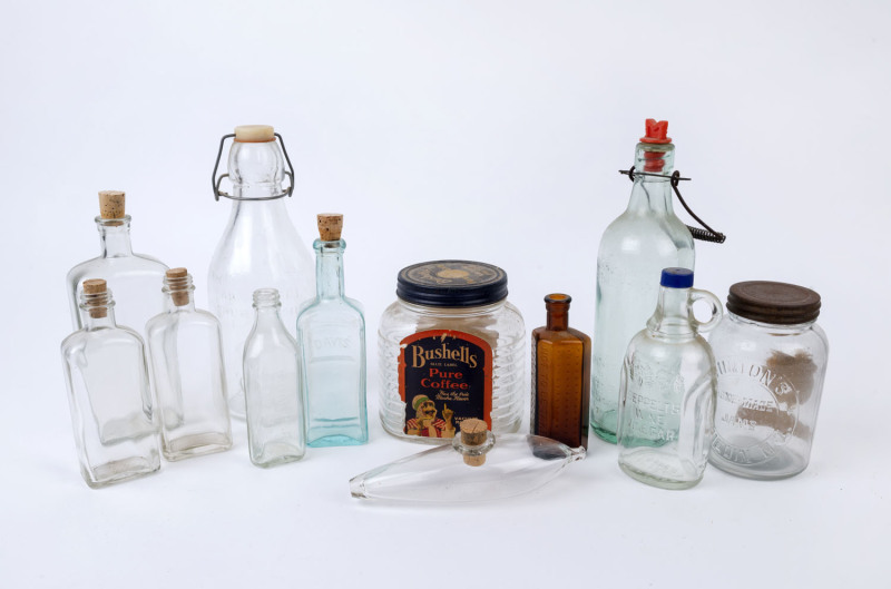 BOTTLES & JARS: vintage group with embossed bottles for Barrett Bros (North Fitzroy) cordial, Thatcher's Dairy one quart of milk, Davis 'Vegetable Pain Killer" & Seppelts wine vinegar; also a Bushell's 16oz coffee jar. (12 items)