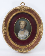 A miniature portrait in oval Florentine frame, 20th century, ​19 x 17cm overall
