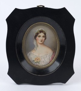 A miniature portrait of a lady with a yellow rose, housed in an ebonized frame with gilt metal mounts, 15 x 13cm overall