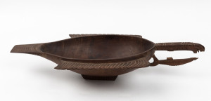 A food bowl with bird motif, carved wood, Papua New Guinea, mid 20th century, ​62cm long