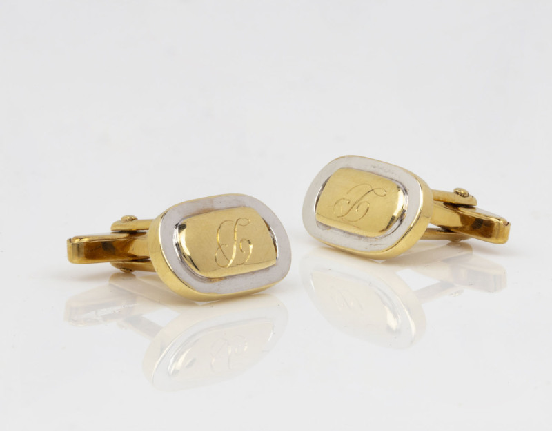 A pair of oval shaped cufflinks, 14ct white and yellow gold set with diamonds, stamped "14k", 10 grams total