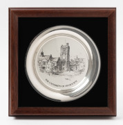 "The University of Melbourne" sterling silver commemorative plate designed by Kenneth Jack for Franklin Mint (1979), mounted, framed & glazed. The plate 20cm diameter.