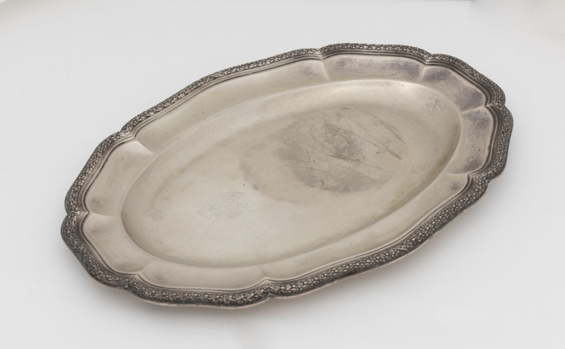 A German silver oval serving platter, early 20th century, stamped "800" with crown and crescent mark, 38.5cm wide, 665 grams