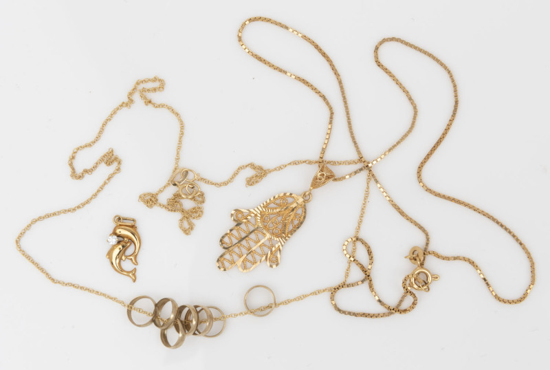 Two 9ct yellow gold necklaces, one with a filigree Hamsa, the other with miniature rings; together with a gold dolphin charm set with a small diamond, 3 items), 6.2 grams total.