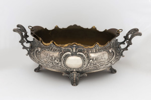An impressive antique German silver bowl with original brass lift out liner, 19th century, stamped "800" with crown and crescent mark, 19.5cm high, 48cm wide, silver weight 1300 grams