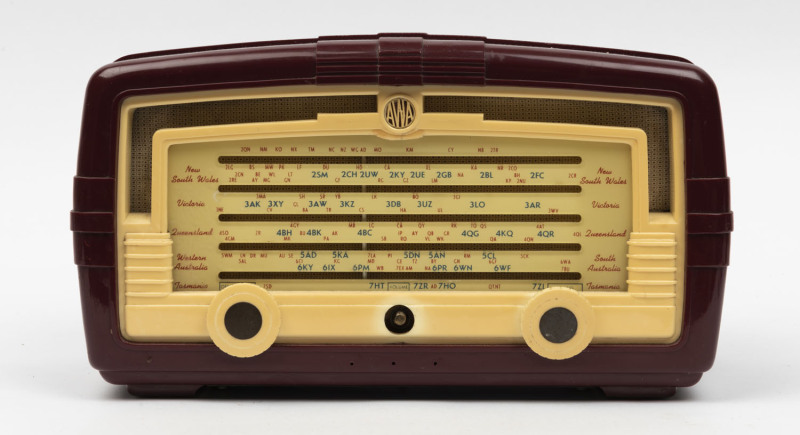 AWA vintage mantel radio in burgundy and ivory plastic case, missing one knob, ​19cm high, 35cm wide