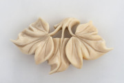 An antique carved ivory leaf brooch, early 20th century, ​7.5cm wide