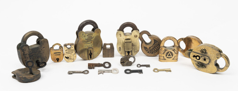 Twelve assorted antique and vintage padlocks with a quantity of keys, 19th and 20th century, ​the largest 12cm high