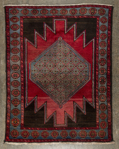 A small Persian hand-knotted rug with red, brown and blue ground, ​144 x 110cm