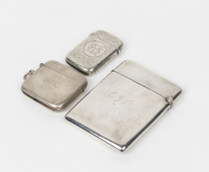 An English sterling silver calling card case together with two vesta match cases, late 19th and early 20th century, (3 items), the card case 9.5cm high, 130 grams total