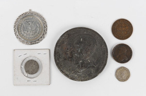 An American 1880 silver dollar, Edwardian exhibition medal and four assorted coins, (6 items), the medal 7.5 cm diameter