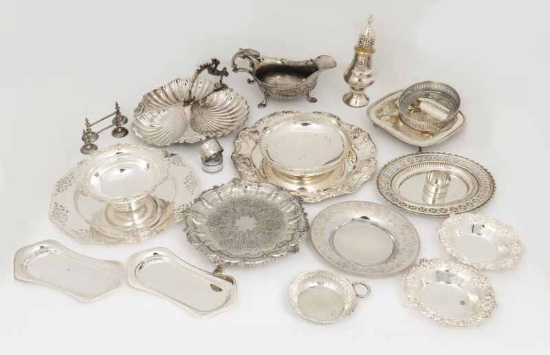 A mixed group lot of 22 silver plated serving dishes, napkin rings and bowls, 20th century, the largest plate 28cm wide.