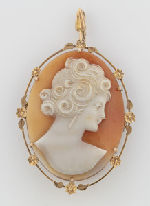 A 9ct gold mounted cameo brooch with "COMBEAU" instructional booklet, early to mid 20th century, ​5.5cm high