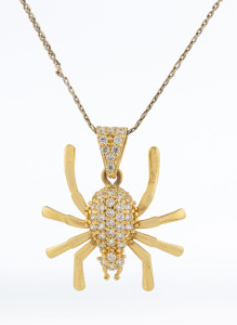 A 9ct white and yellow gold and diamond pendant on chain, ​50cm long