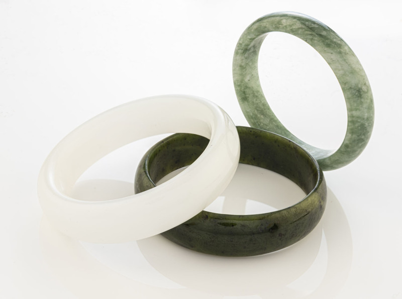 Three Chinese jade bangles, 20th century,