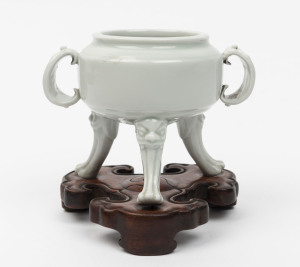 Blanc de chine three legged pot on carved timber stand, 19th/20th century, 13.5cm high overall