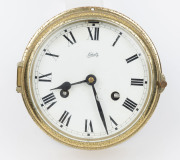 SCHATZ German ship's clock with time and strike movement in brass case, 20th century, ​18cm diameter