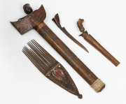 Three Indonesian daggers and a Pacific Islands comb, 20th century, (4 items), the largest 45cm long