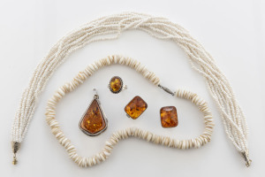 Amber and silver cufflinks, pendant and ring together with two coral bead necklaces, late 20th century, (5 items)