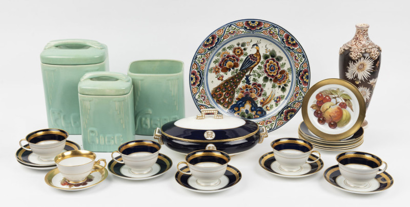 A mixed lot of 20th century porcelain, comprising of 3 green glazed kitchen canisters, a Delft hand-painted charger, lidded serving dish by Cauldon England, a Chinese vase, 5 gilt decorated cups and 6 matching saucers, a gilt cup, saucer and small plate,