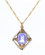 A 9ct gold and amethyst pendant on gold chain, ​42cm long